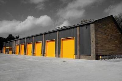 warehouse exterior with yellow doors